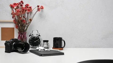 Creative designer workspace with camera, digital tablet, coffee cup and picture Stock Photos