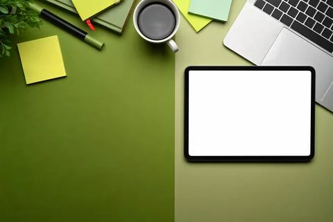 Creative designer workspace with digital tablet, laptop, notebook and coffee cup Stock Photos