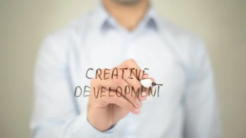 Creative Development,  Man writing on transparent screen Stock Photos
