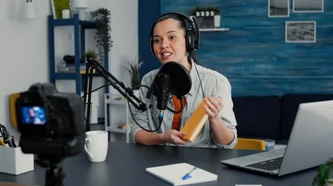 Creative digital content creator recording agenda review while in home studio Stock Photos