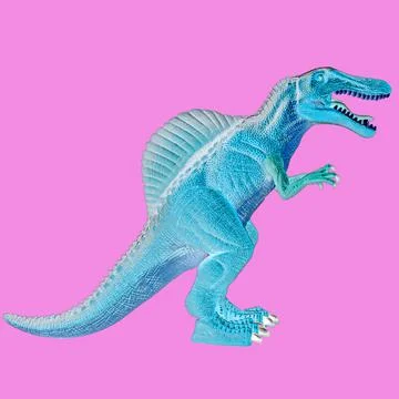 Creative dinosaur inversion color on pink background. Abstract art. Stock Photos