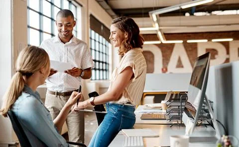 Creative, discussion or team in office with paper, ads feedback or review o.. Stock Photos