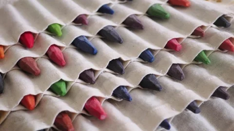 Creative display of crayons in fabric holder Stock Footage 344096419