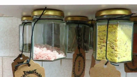 Creative Display of Jars With Spices Hanging from Shelf in Kitchen Stock Footage 84035603