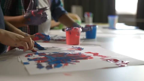 Creative diverse children finger drawing at lesson Video stock 99792583