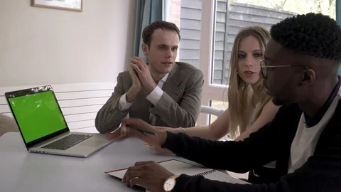 Creative Diverse Professionals At home discusing business matters Stock Footage 89922873