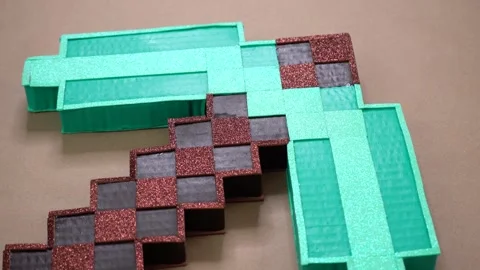 Creative DIY Cardboard Pickaxe Craft for Artistic and Hands-On Fun Stock Footage 327503921