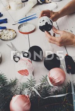 Creative diy craft hobby. Handmade christmas decoration, balls and garland Stock Photos