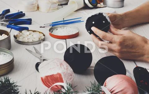 Creative diy craft hobby. Handmade christmas decoration, balls and garland Stock Photos