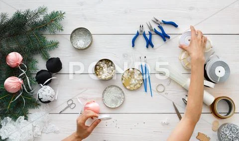 Creative diy hobby. Handmade christmas decoration, balls and garland Stock Photos