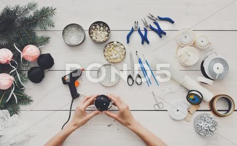 Creative diy hobby. Handmade christmas decoration, balls and garland Stock Photos