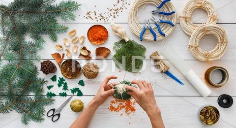 Creative diy hobby. Handmade craft christmas decoration, balls and garland Stock Photos