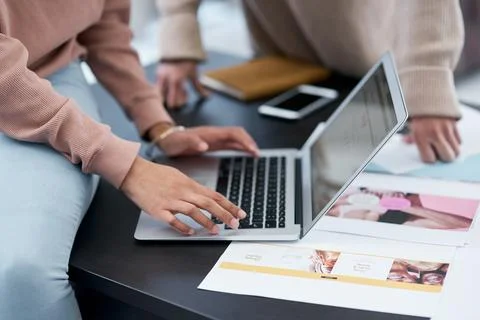 Creative, documents and hands with laptop, teamwork and schedule for design.. Stock Photos