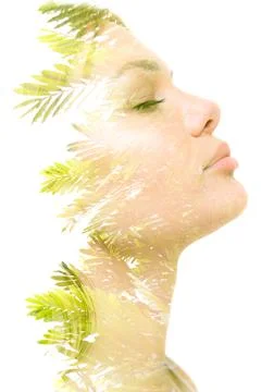 Creative double exposure portrait of a young woman Stock Photos
