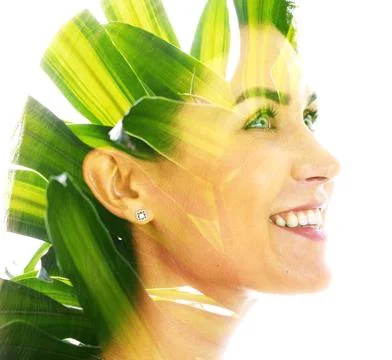 Creative double exposure portrait of a young cheerful woman Stock Photos