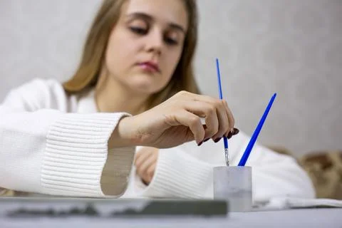 Creative drawing workshop with leading young artist. Professional girl work.. Stock Photos