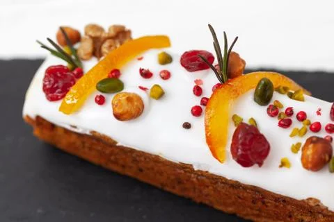 Creative Easter cake with nuts, dried fruits, candied fruit and spices. Happy Foto stock