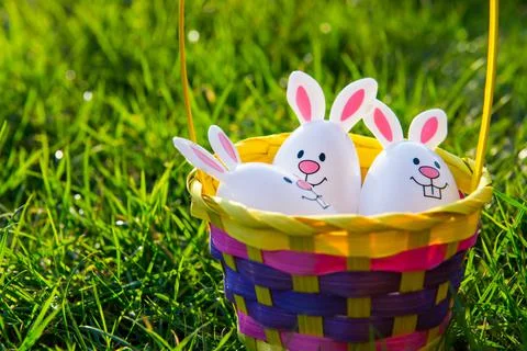 Creative Easter composition of Funny Easter egg with bunny ears inside in the Stock Photos