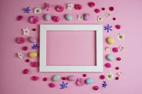 Creative Easter composition with spring flowers and buds Stock Photos