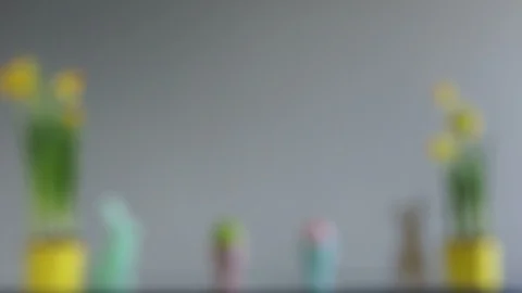 Creative Easter decor, Happy Easter. Easter concept. Daffodils in yellow pots Stock Footage 101464566