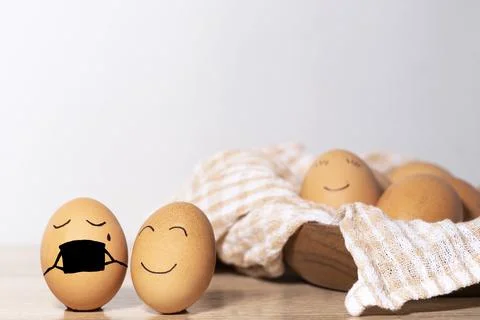Creative Easter eggs with Corona virus protection, egg in a black mask in a q Stock Photos