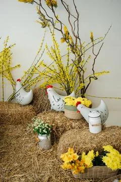 Creative Easter Interior Decoration with Forsythia Branches and Hen Balloons Stock Photos