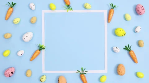 Creative Easter pattern with eggs and carrots and copy space fame. Stop motion Stock Footage 149926570