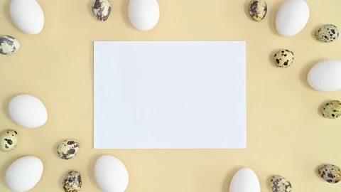Creative Easter pattern with white and quail eggs and copy space. Stop motion Stock Footage 171445528