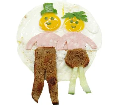 Creative egg breakfast for child face form Stock Photos