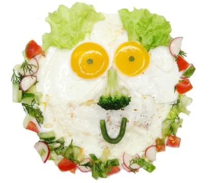 Creative egg breakfast for child face form Stock Photos