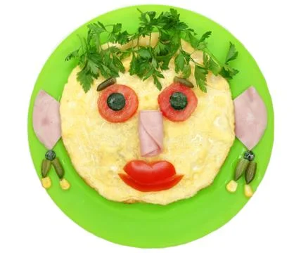 Creative egg breakfast for child face form Stock Photos
