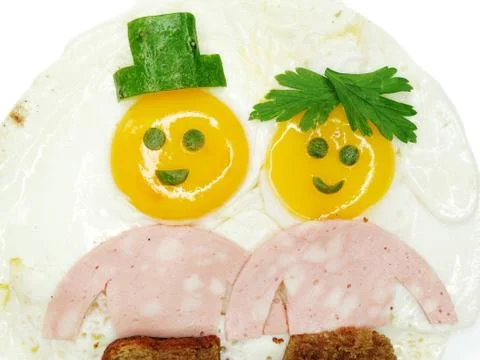 Creative egg breakfast for child face form Stock Photos