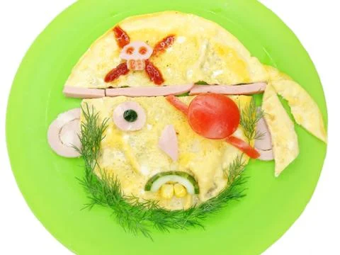 Creative egg breakfast for child face form Stock Photos