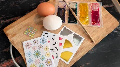 Creative Egg Decoration Kit With Paints Stickers And Brush On Board 스톡 사진