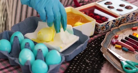 Creative egg painting process with Easter eggs step by step and unique Stock Footage 306066559
