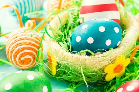 Creative eggs in basket Stock Photos