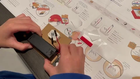 Creative engineering activities for kids. STEAM project kits teaching kids Stock Footage 152196555