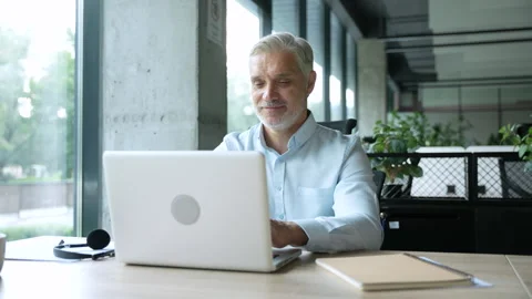 Creative entrepreneur typing on laptop Stock Footage 295181786