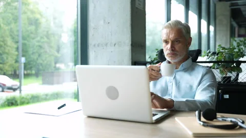 Creative entrepreneur typing on laptop Stock Footage 295182043