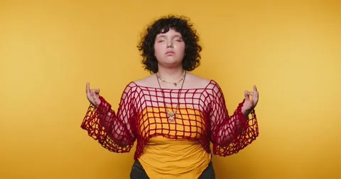 Creative expression through meditation in a vibrant studio setting with a y.. Stock Footage 313273736