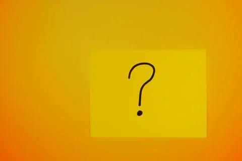 Creative expression of uncertainty on a bright yellow background Stock Photos