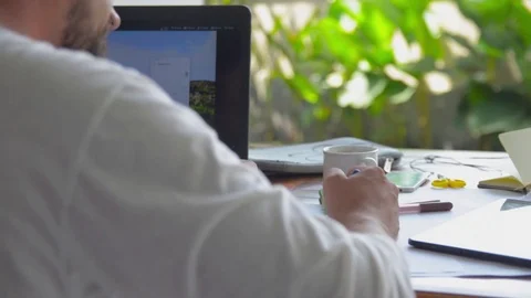 Creative fashion design men develop ideas and looking laptop Stock Footage 72347759