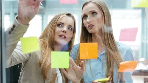 Creative female team at office working on new business strategy Stock Footage 49957797