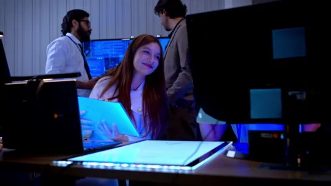 Creative female technology professionals collaborating on digital product Stock Footage 340463427
