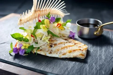 Creative fine dining fish dish Stock Photos