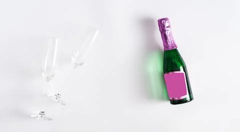 Creative flat lay composition with bottle of champagne and space for text on  Stock Photos