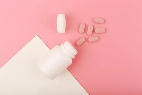 Creative flat lay with nutritional supplement or vitamins for woman. Opened Stock Photos