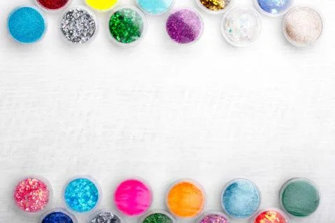 Creative flat lay overhead composition with sequins, glitter, mica and shimme Stock Photos