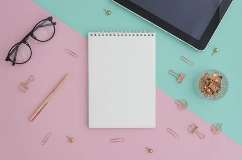 Creative flat lay photo of workspace desk with tablet, eyeglasses, gold Stock Photos