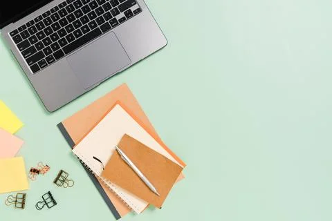 Creative flat lay photo of workspace desk. Top view office desk with laptop.. Stock Photos